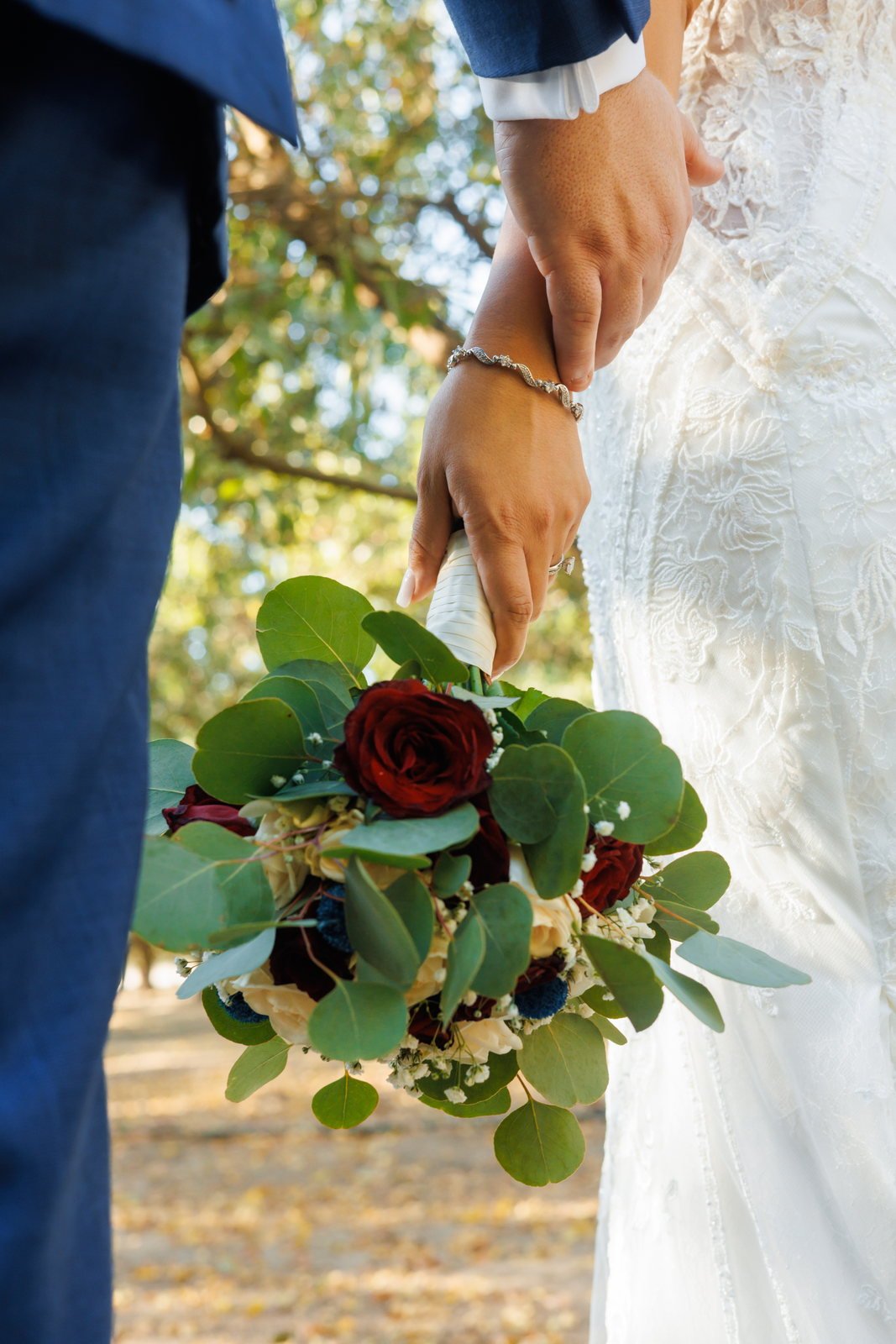 The bride's bouquet held between the couple